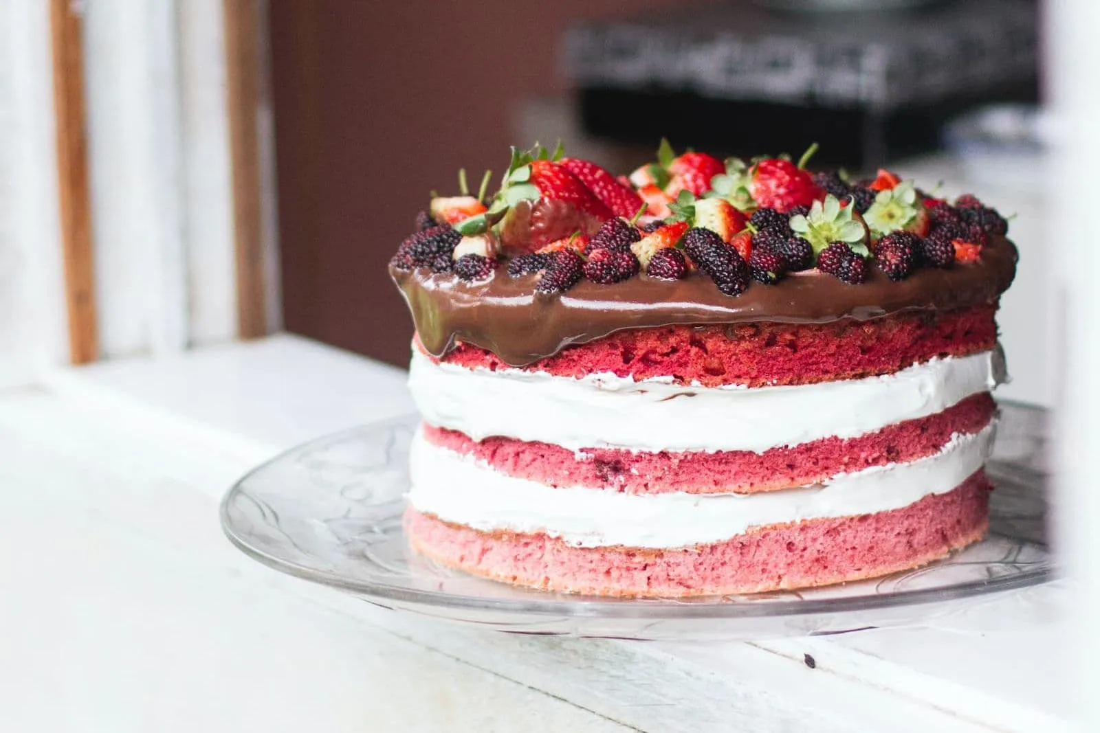 A cake with several visible layers.
