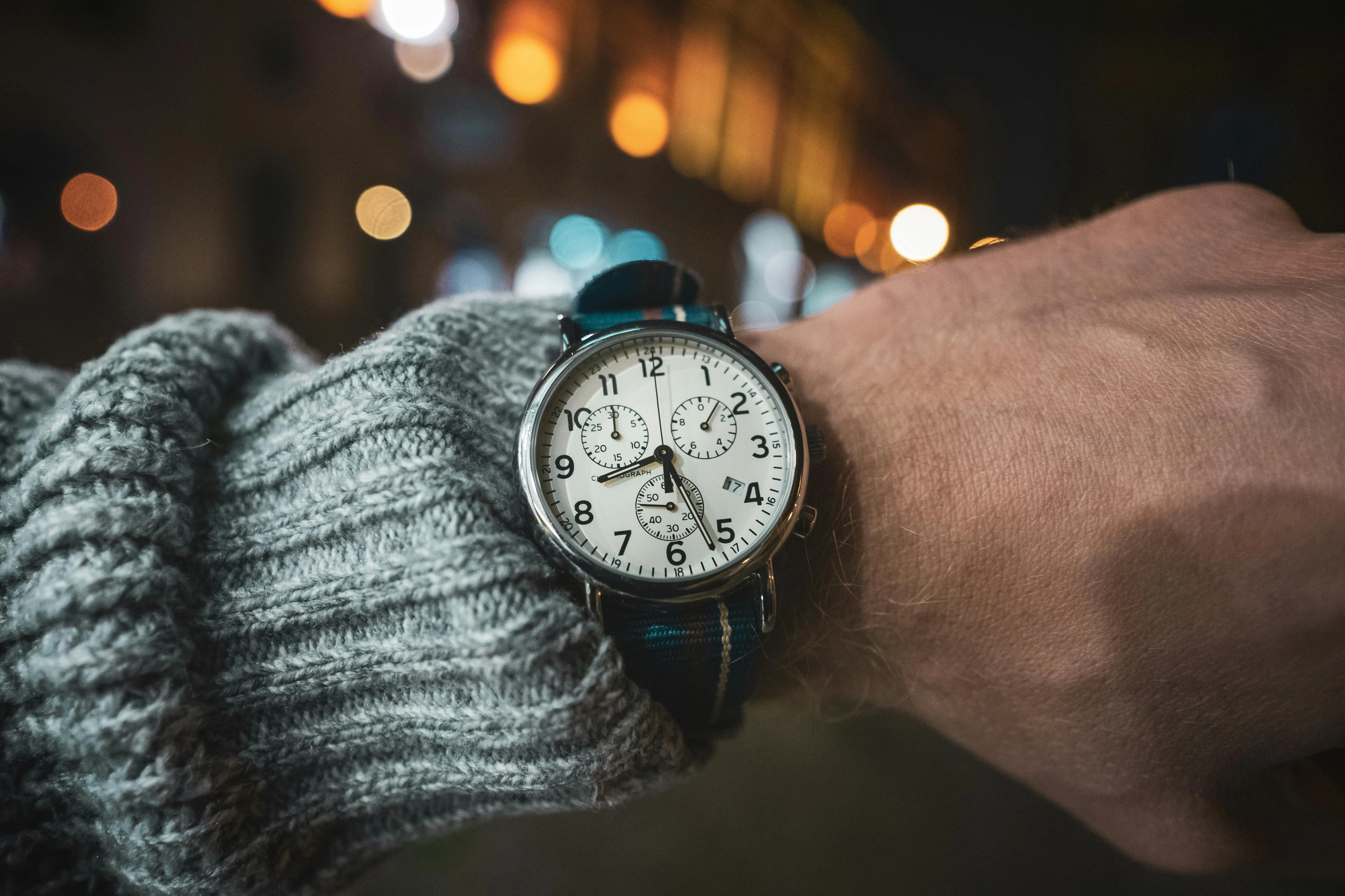 A closeup of an analogue wrist watch.