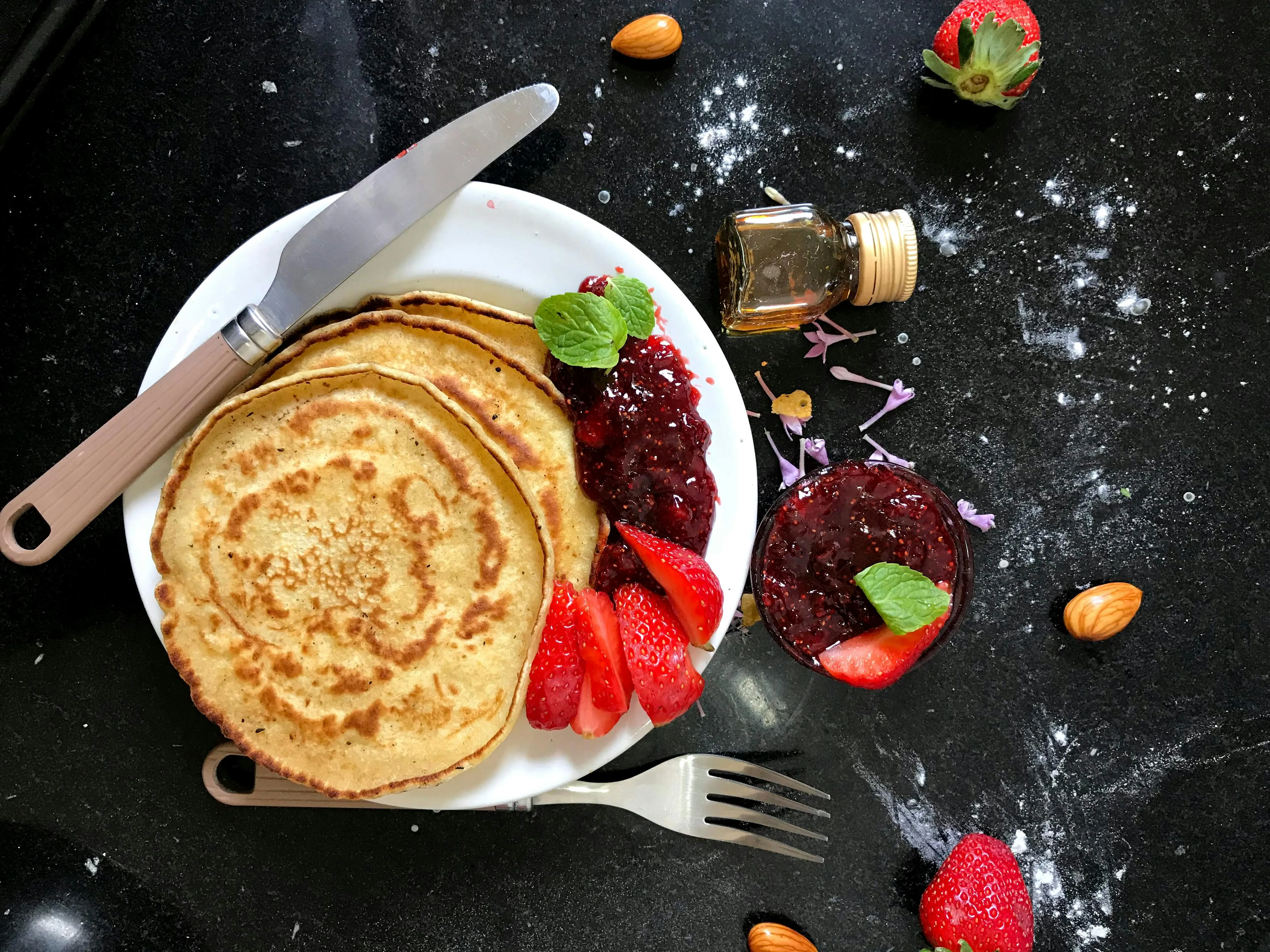 Several pancakes stacked on top of each other.